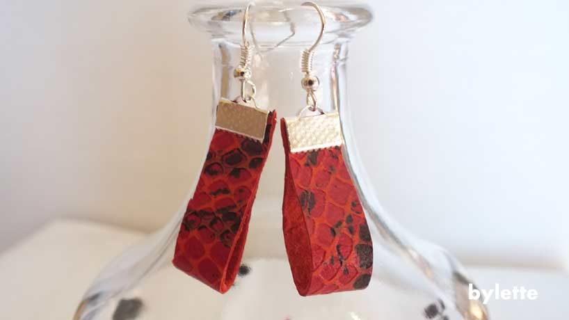 Short red leather earrings